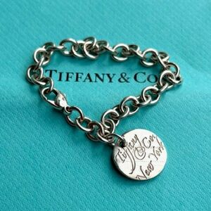 Tiffany & Co. 925 Silver Wavy Round Tag Note Charm Bracelet